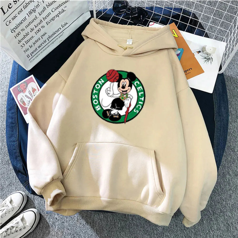 Beige hoodie with Boston Celtics logo on a textured surface