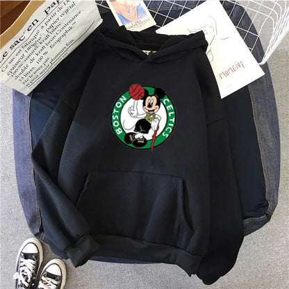 Black hoodie with a Boston Celtics logo on a gray surface