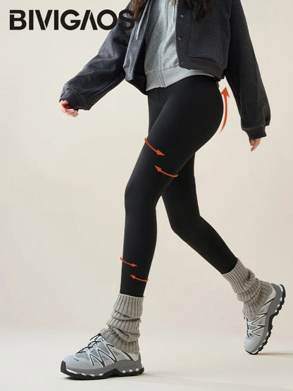 Person wearing black leggings with orange accents and gray shoes on a beige background, featuring the brand 'BIVIGAOS'.