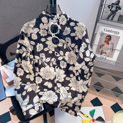 Floral-patterned shirt on a hanger with a magazine in the background