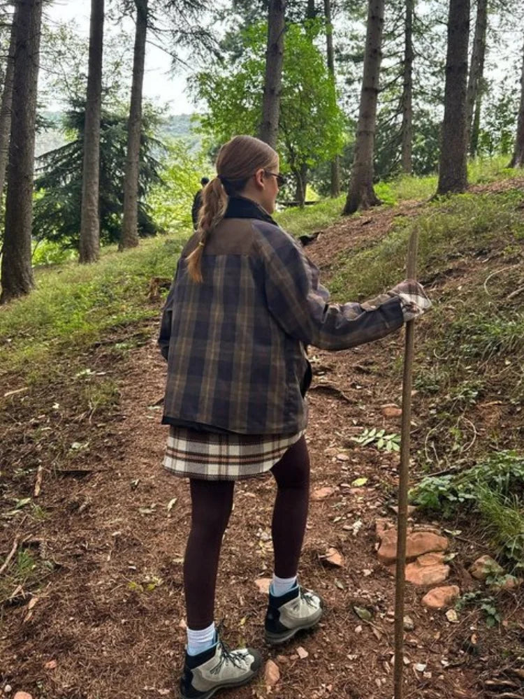 Person hiking on a trail in a forest