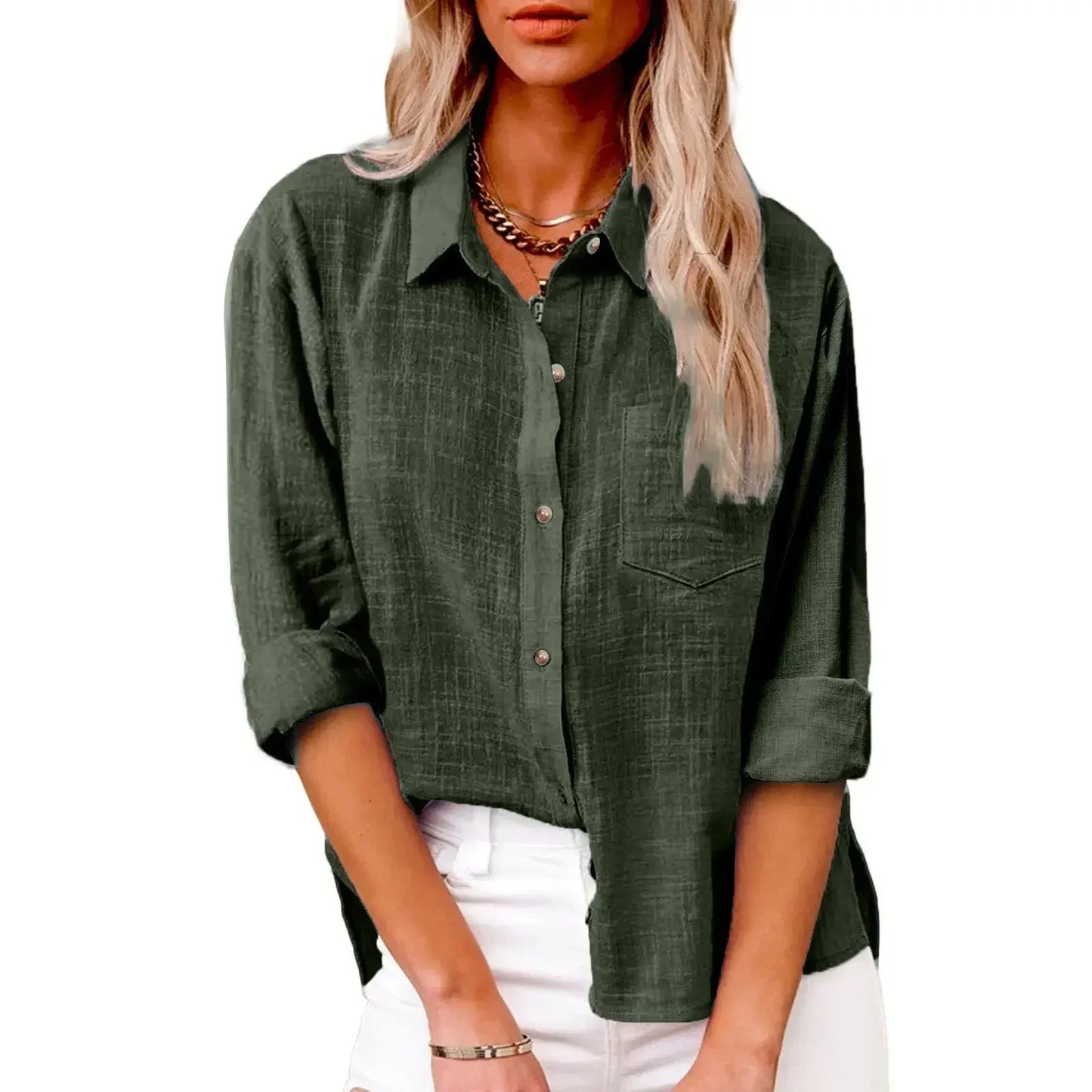 Person wearing a green button-up shirt with rolled-up sleeves on a white background