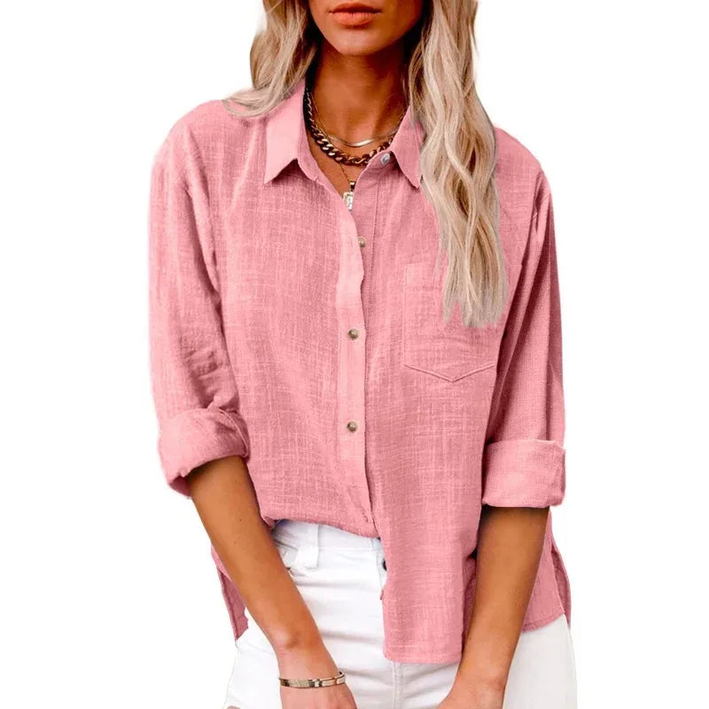 Pink button-up shirt worn by a person on a white background
