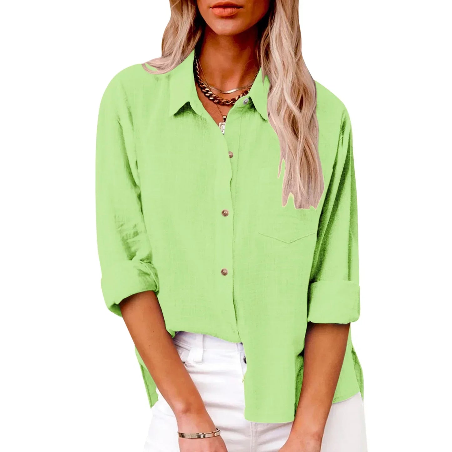 Person wearing a light green button-up shirt on a white background