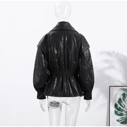 Black leather jacket on a mannequin against a white background