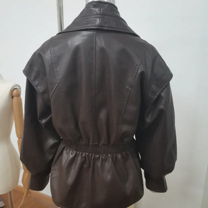 Black leather jacket on a mannequin against a white background