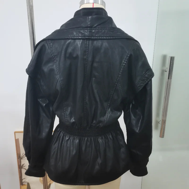 Black leather jacket on a mannequin against a white background
