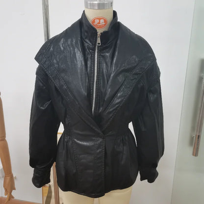 Black leather jacket on a mannequin against a white background