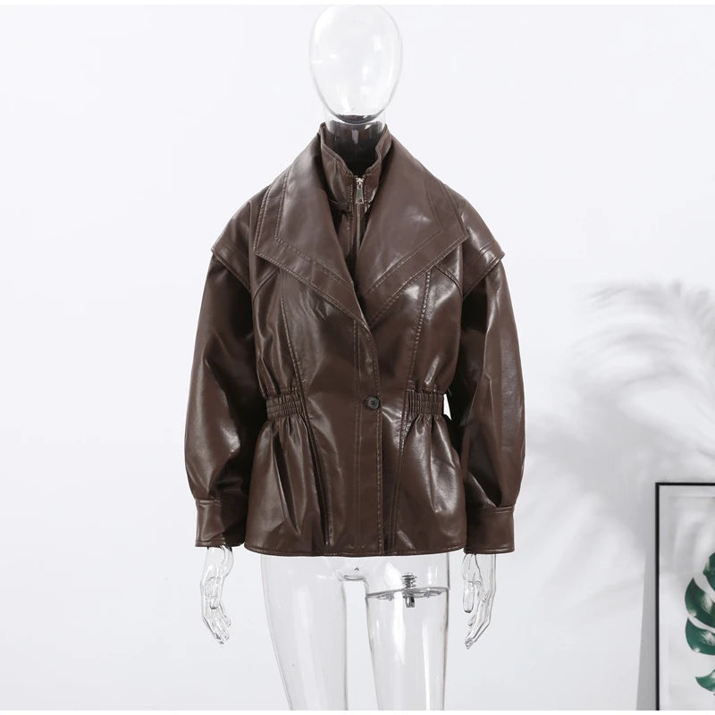 Brown leather jacket on a mannequin against a white background