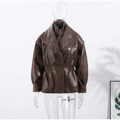 Brown leather jacket on a mannequin against a white background