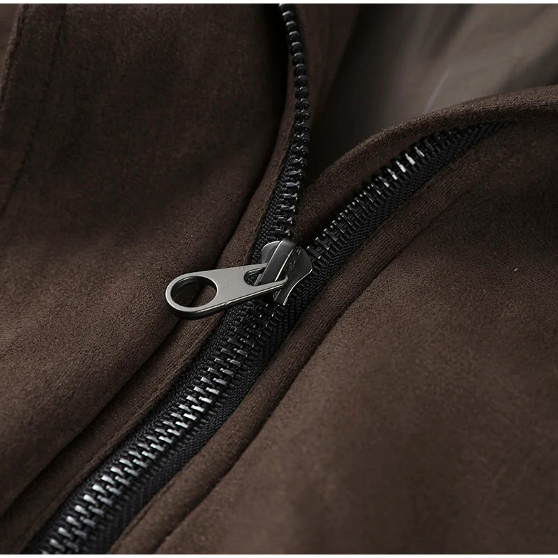 Close-up of a zipper on a brown jacket