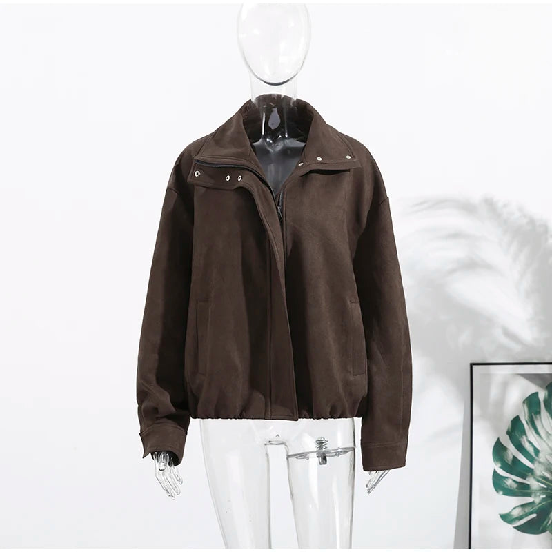 Brown jacket on a mannequin against a white background