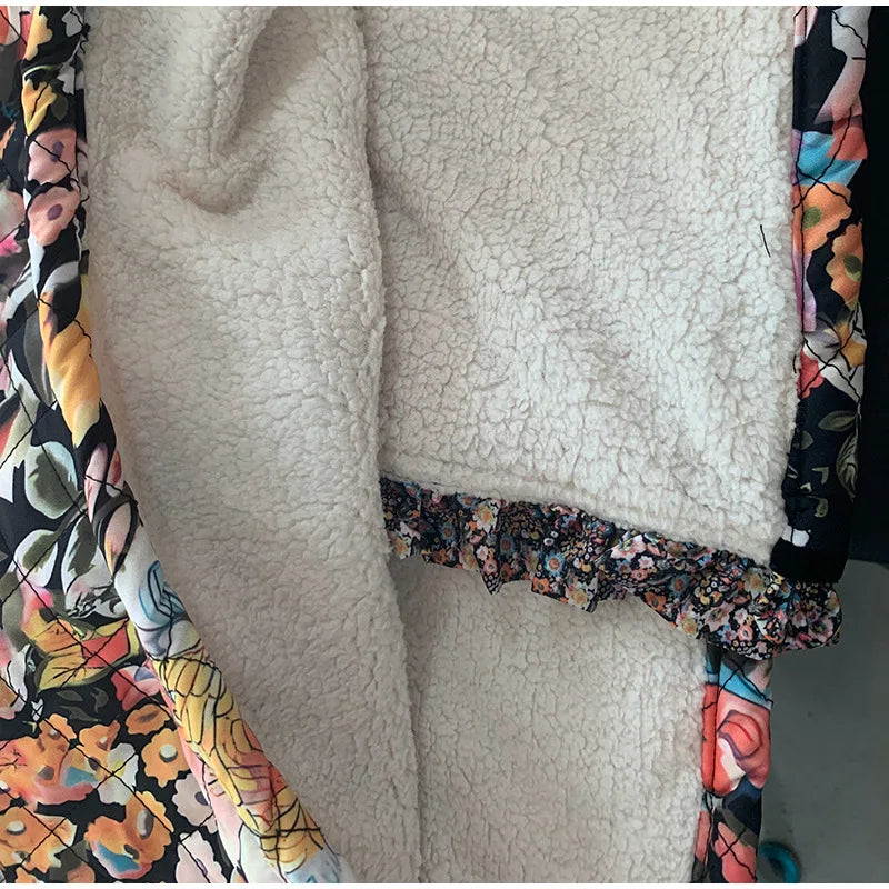 Close-up of a textured fabric with floral patterns on a neutral background