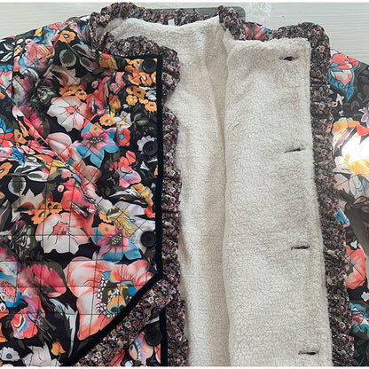 Floral-patterned coat with a white interior lining on a light background