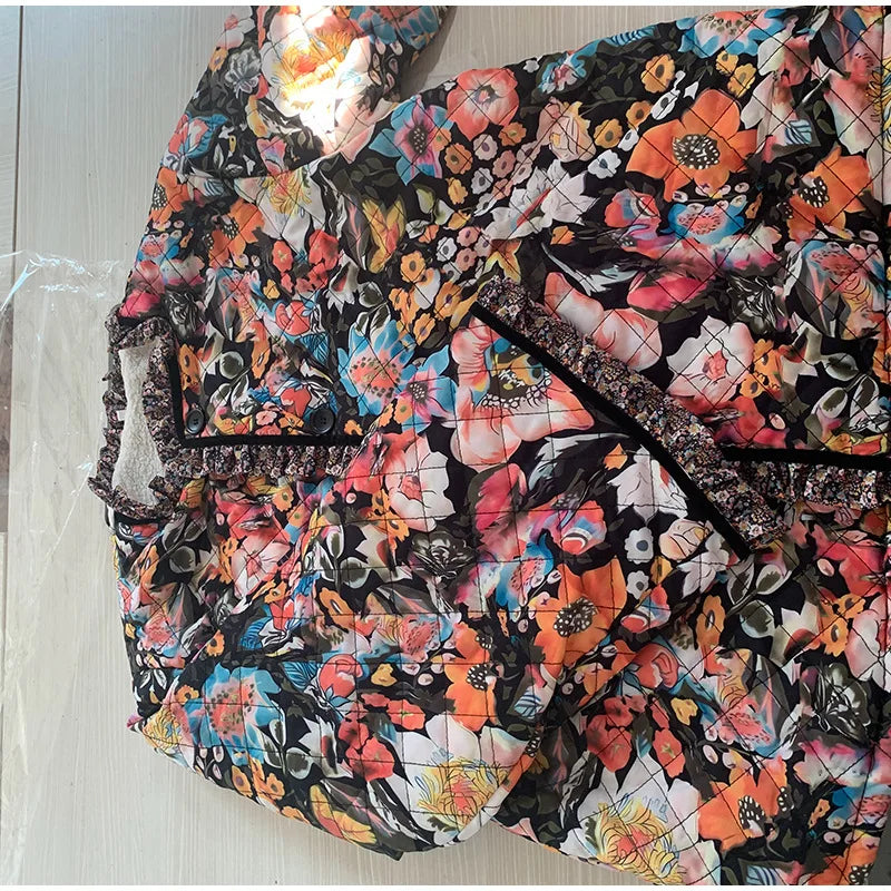 Floral patterned bag on a light wooden surface