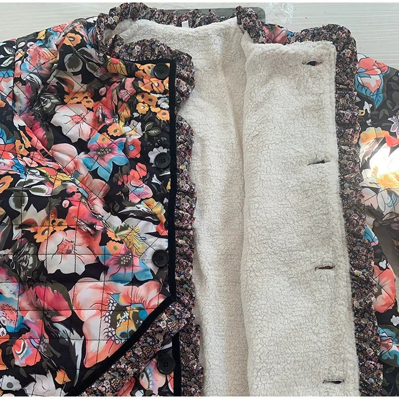 Floral-patterned coat with a white lining on a light background