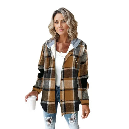 Woman wearing a plaid shirt with a white background